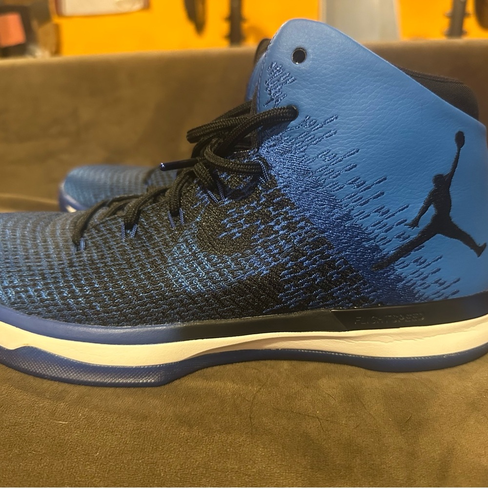 Jordan Blue and Black High-Top Sneakers